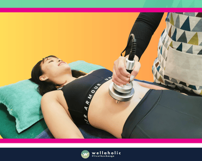 In the bustling city-state of Singapore, a woman is availing the innovative WellaSculpt RF body sculpting treatment at Wellaholic. This state-of-the-art treatment is designed to assist individuals in their journey towards achieving their desired body shape by using radio frequency energy to heat tissue and stimulate subdermal collagen production, reducing the appearance of loose skin and cellulite. The WellaSculpt RF body sculpting treatment is a non-surgical procedure that employs the principle of radio frequency therapy to heat the dermis, the deepest skin layer, without damaging the epidermis, the top layer of skin. This process stimulates the production of new collagen and elastin, resulting in tighter, younger-looking skin. The efficacy of the WellaSculpt RF body sculpting treatment is well-documented. Numerous customers have reported noticeable changes after just a handful of sessions, making it a sought-after choice for those in pursuit of a safe and effective body sculpting technique. The woman undergoing the treatment is under the care of Wellaholic’s highly trained staff. Their proficiency and commitment to customer satisfaction ensure a positive and relaxing experience throughout the treatment process.