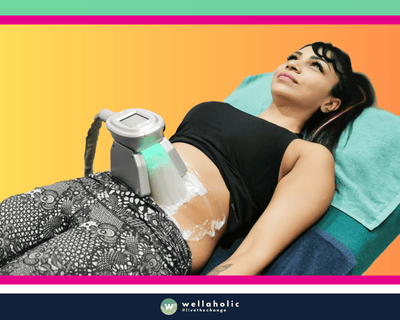 In the bustling city of Singapore, a woman is availing the state-of-the-art WellaFreeze 360 fat freeze treatment at Wellaholic. This revolutionary treatment is designed to assist individuals in their journey towards achieving their desired body shape by targeting and eliminating stubborn fat cells through a process of controlled cooling. The WellaFreeze 360 fat freeze treatment is a non-surgical procedure that employs the principle of cryolipolysis to freeze and destroy fat cells, leaving the surrounding tissues unaffected. The body then naturally metabolizes and expels these dead cells over time, resulting in a more defined and contoured physique. The efficacy of the WellaFreeze 360 fat freeze treatment is well-documented. Numerous customers have reported noticeable changes after just a handful of sessions, making it a sought-after choice for those in pursuit of a safe and effective fat reduction technique.