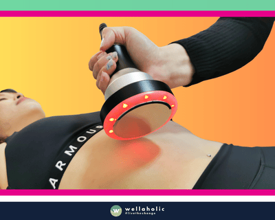 In the bustling city-state of Singapore, a woman is availing the innovative WellaCavi Ultrasonic Fat Cavitation treatment at Wellaholic. Wellaholic’s WellaCavi uses ultrasound fat cavitation to break apart the fat deposits in your body. Also known as ultrasonic lipolysis, this body contouring treatment is also known by other names such as Ultrashape or Liponix. WellaCavi is a much safer alternative to surgical options, such as liposuction. This cavitation treatment is most ideal for targeting small areas of fat to help you contour and sculpt your body. The efficacy of the WellaCavi Ultrasonic Fat Cavitation treatment is well-documented. Numerous customers have reported noticeable changes after just a handful of sessions, making it a sought-after choice for those in pursuit of a safe and effective body sculpting technique. The woman undergoing the treatment is under the care of Wellaholic’s highly trained staff. Their proficiency and commitment to customer satisfaction ensure a positive and relaxing experience throughout the treatment process.