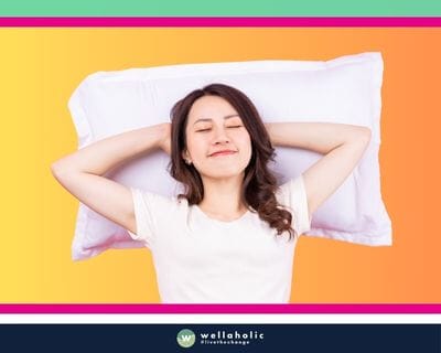 Asian-lady-sleeping-happily-on-a-white-pillow