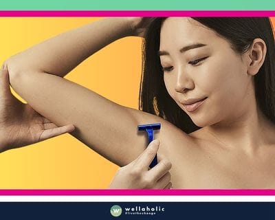 an asian lady undergoing shaving for her underarm/armpit by a therapist 