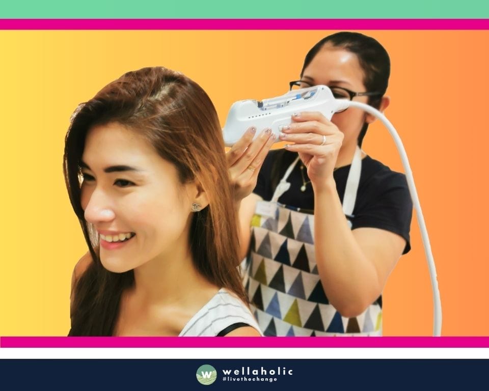 In the vibrant city of Singapore, a female customer is experiencing the innovative Scalp RF Microneedling treatment at Wellaholic. This advanced treatment is designed to help individuals achieve their hair health goals by using a combination of radio frequency (RF) and microneedling technologies to stimulate the scalp and promote hair growth. The Scalp RF Microneedling treatment is a non-invasive procedure that uses tiny needles to create micro-channels in the scalp, which triggers the body’s natural healing process and stimulates the production of growth factors that are beneficial for hair growth. The RF energy is then delivered through these channels, further enhancing the health of the scalp and hair follicles. This dual-action process results in healthier, thicker, and more robust hair, enhancing the individual’s overall appearance. The effectiveness of the Scalp RF Microneedling treatment is widely recognized. Many customers have reported visible improvements in their hair thickness and health after just a few sessions, making it a popular choice for those seeking a safe and effective hair health treatment. The female customer undergoing the treatment is in the capable hands of Wellaholic’s professional staff. Their expertise and dedication to customer satisfaction ensure a positive and comfortable experience throughout the treatment process.